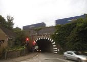 Container train crossing Lower Road - Geograph - 4644991.jpg