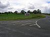 Fixed sign for Horseshoe Pass at the A5104-A542 junction - Coppermine - 21235.jpg