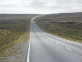 Mid Yell- the A968 heads for West... (C) Chris Downer - Geograph - 3651604.jpg