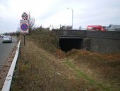 Disused railway bridge in the middle of the A41 - Geograph - 1606173.jpg