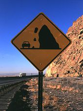 New-mexico-symbolic-falling-rock-warning-sign-detail.jpg