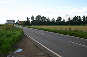 Wind turbine behind vegetable packing plant on the B1040 - Geograph - 498410.jpg