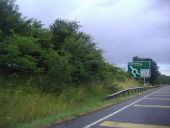 The A40 approaching Asthall Barrow - Geograph - 3575709.jpg