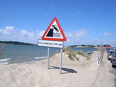 Ferry slipway sign and cars queuing for ferry - Geograph - 887281.jpg