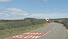 Sharp bend in the road - Geograph - 520380.jpg