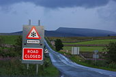 Snow Closure sign by the junction of the A685 and A683 - Geograph - 902592.jpg