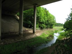The Nailbourne as it flows under the A2 (C) Nick Smith - Geograph - 1338537.jpg