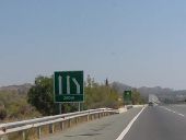 Cyprus motorway sign for a lane drop - Coppermine - 18708.jpg