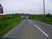 The A6137 heading south beneath the London to Edinburgh Railway Line - Geograph - 834606.jpg