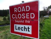 A939 Corgarff - Closed at Lecht hinged sign.jpg
