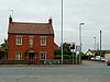 Brick cottage at Aston Cross - Geograph - 1499486.jpg