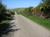 Minor road westwards towards the Tyn Cae road junction - Geograph - 1259199.jpg