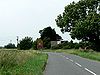 The Road from the B1233 towards Olive Bush Farm - Geograph - 194615.jpg