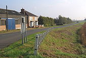 B1093 heading south from Angle Corner Bridge - Geograph - 581591.jpg