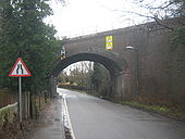 Railway bridge over Warehorne Road - Geograph - 1722836.jpg